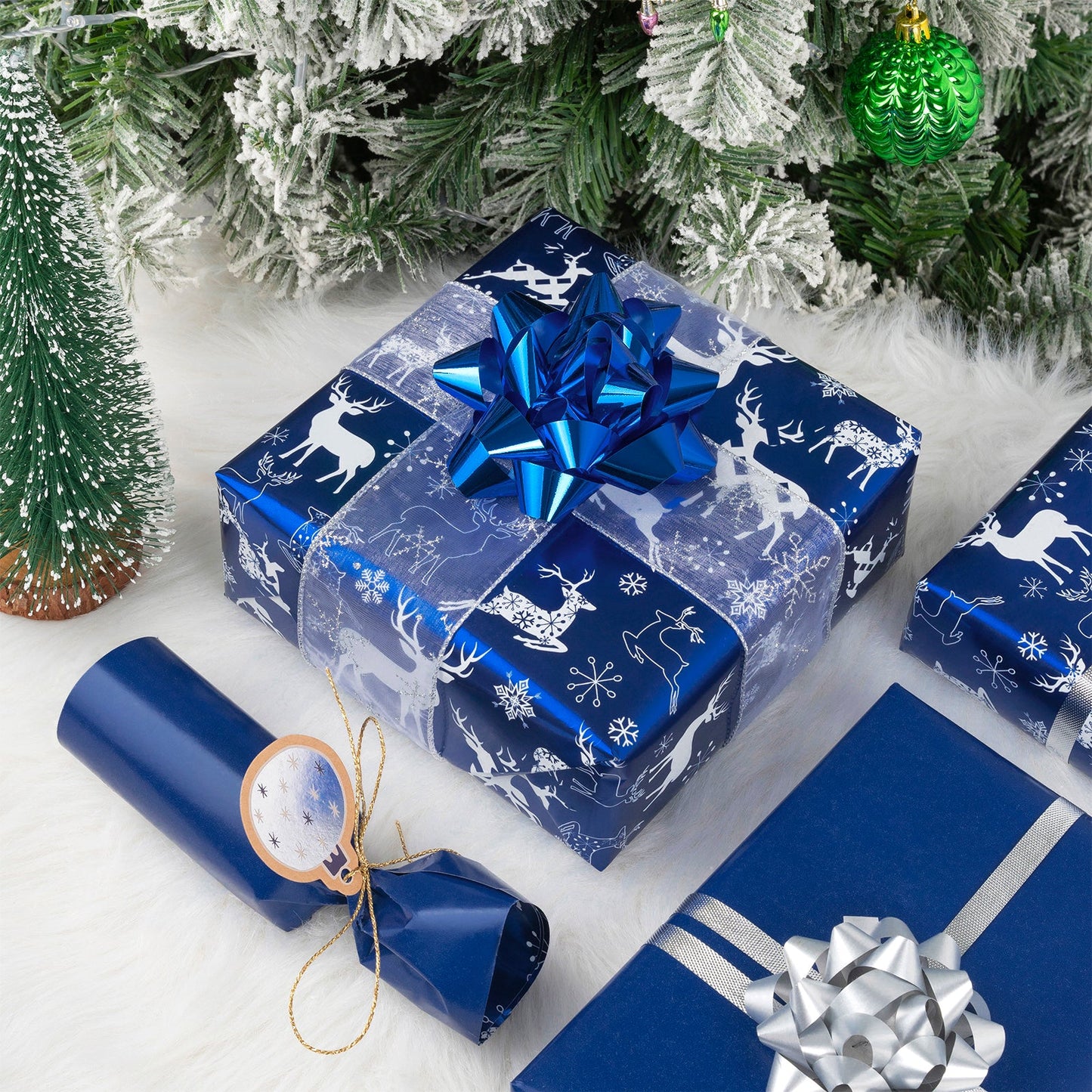 Navy Blue Deer Christmas Wrapping Paper Roll with Solid Navy Blue on Reverse.