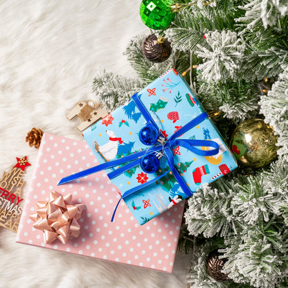 Northern Christmas Wrapping Paper Roll with White Polka Dots Printed on Pink Background
